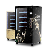 Zwei Verkaufsautomaten mit Sektmotiven, schwarzer Automat vorne, heller Automat im Hintergrund      